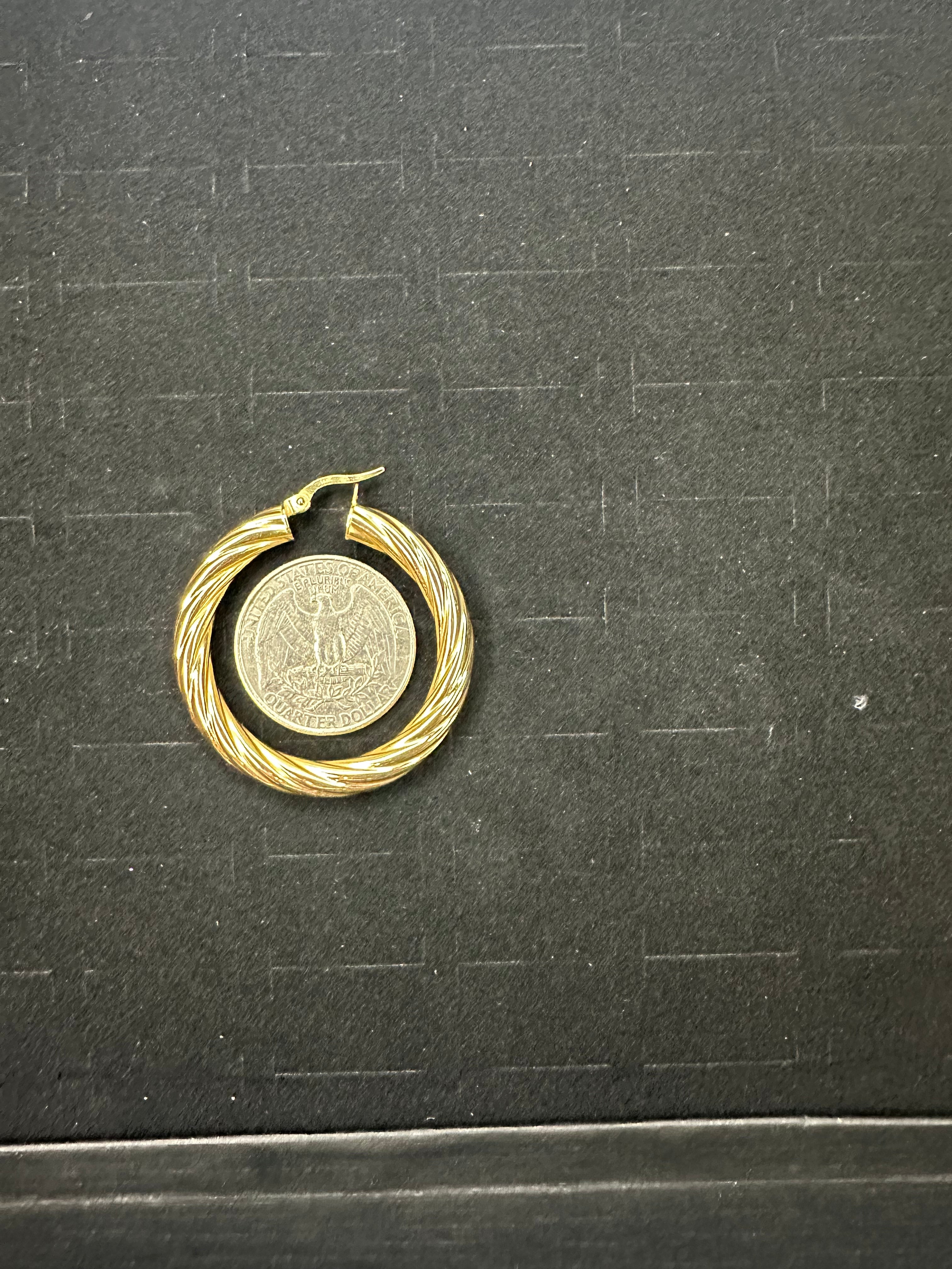 Argollas Grande Torcidas de Oro 14K