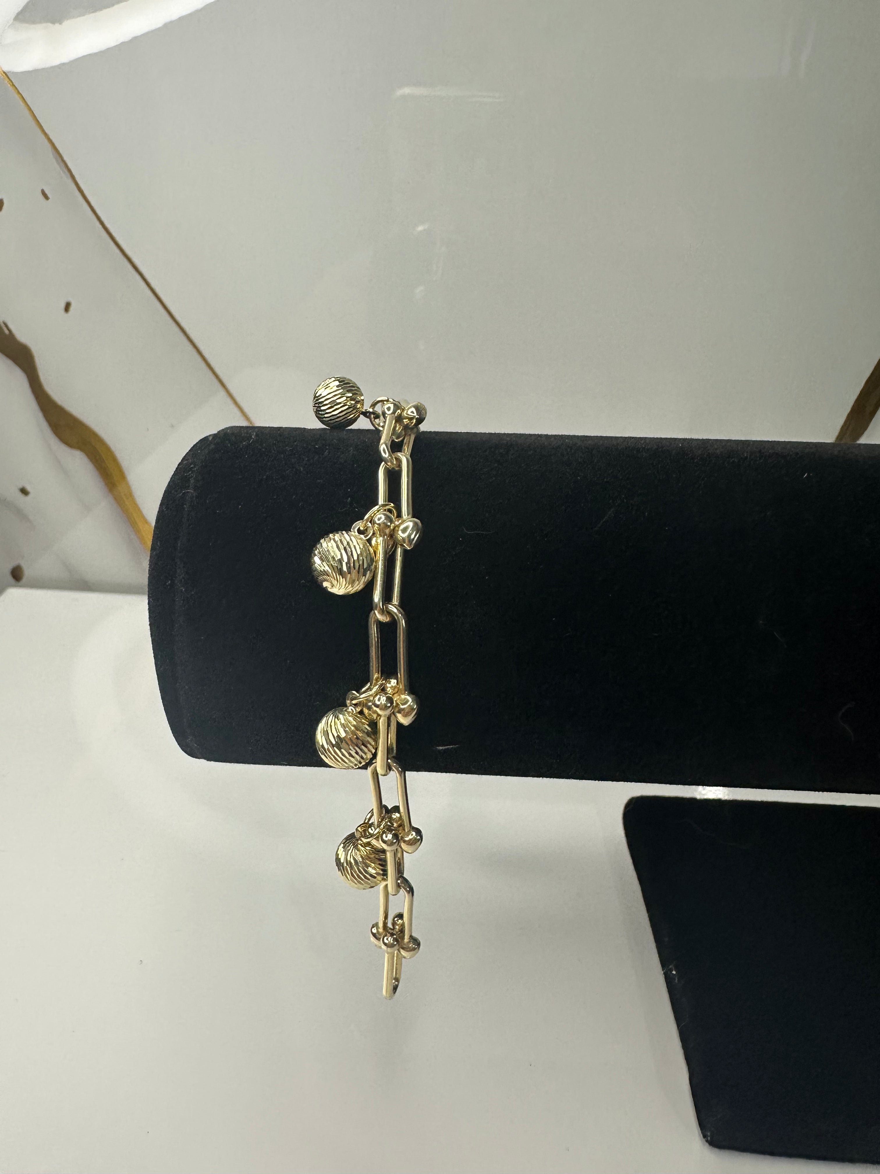 Manilla con Esferas Brillantes - Oro 10k, 7"